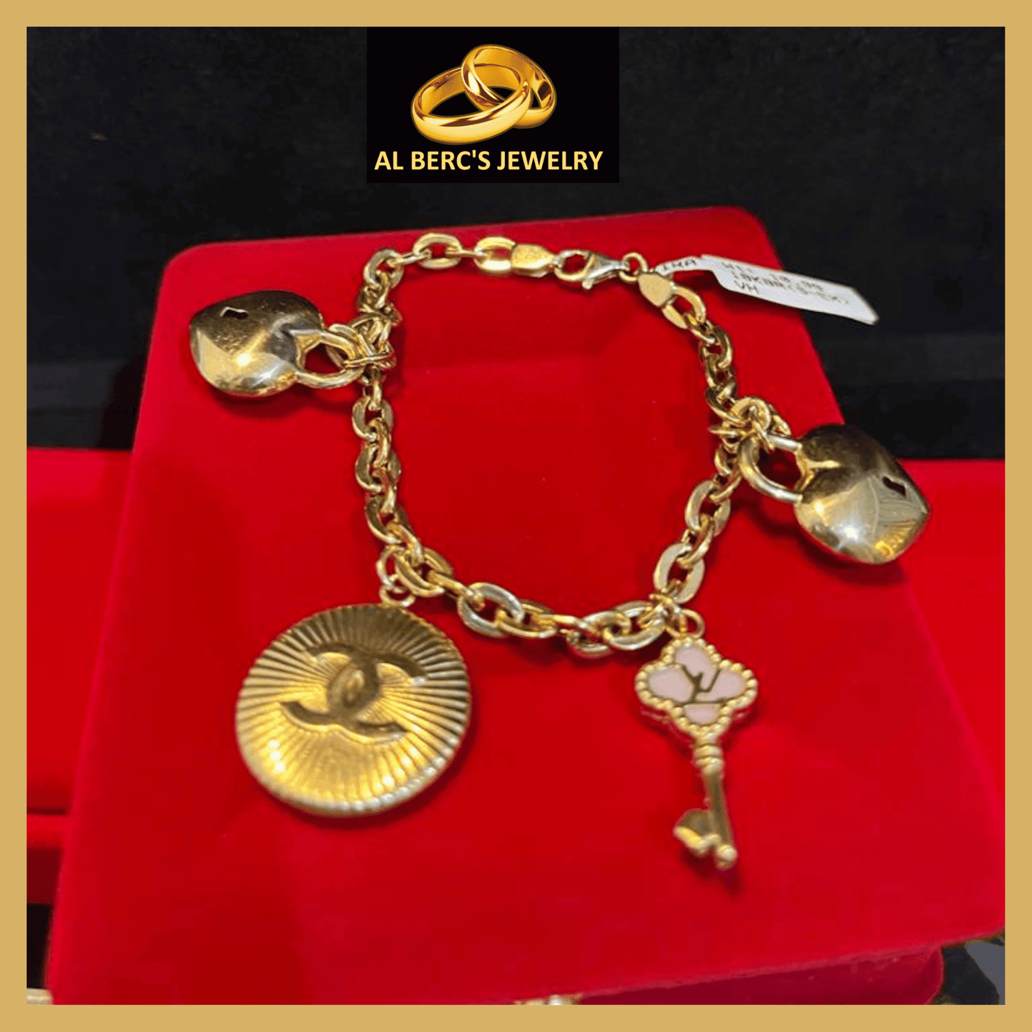 showing an 18K Gold Bracelet for Women with 4 different big pendants