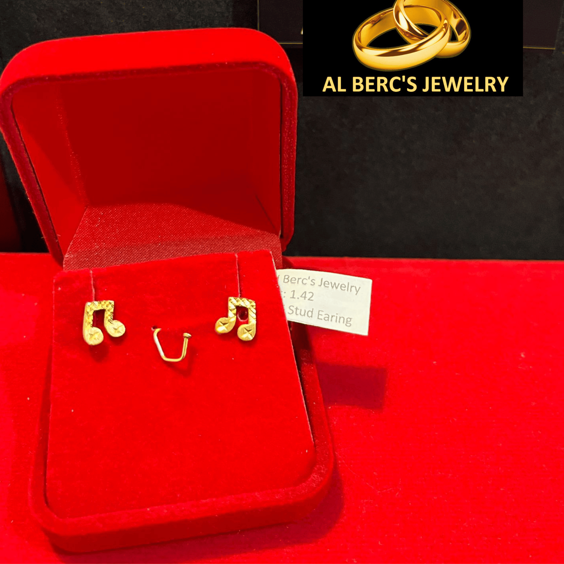 showing an 18K Musical Notes Stud Earring